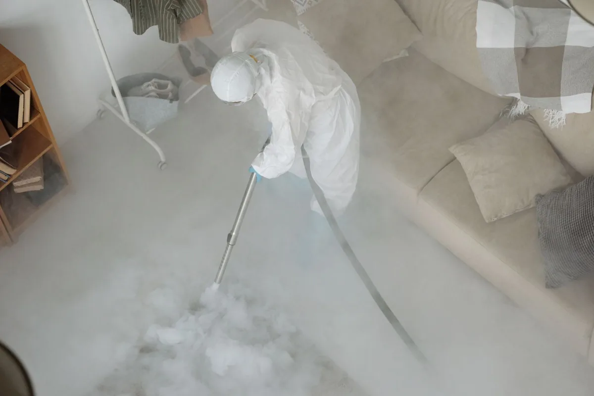 Biohazard cleanup technician in protective equipment, Palm City, FL